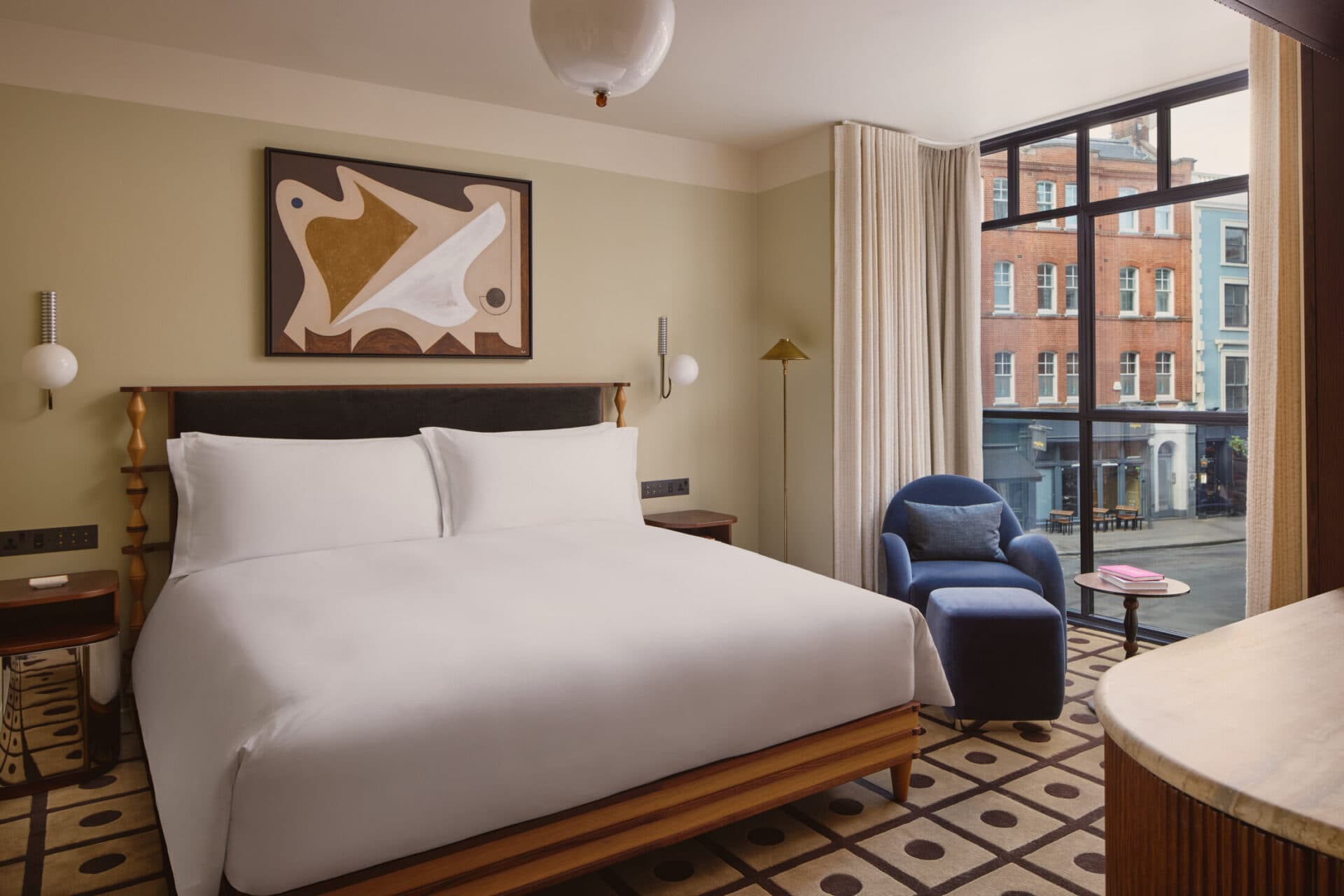 One-Bedroom Suite bedroom with upholstered headboard