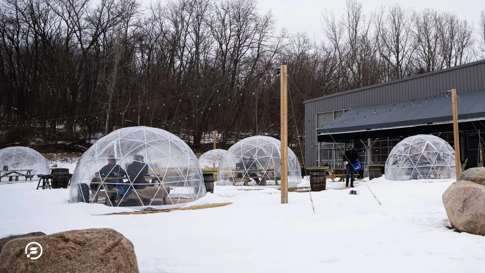 Outdoor igloo tables next to the brewery
