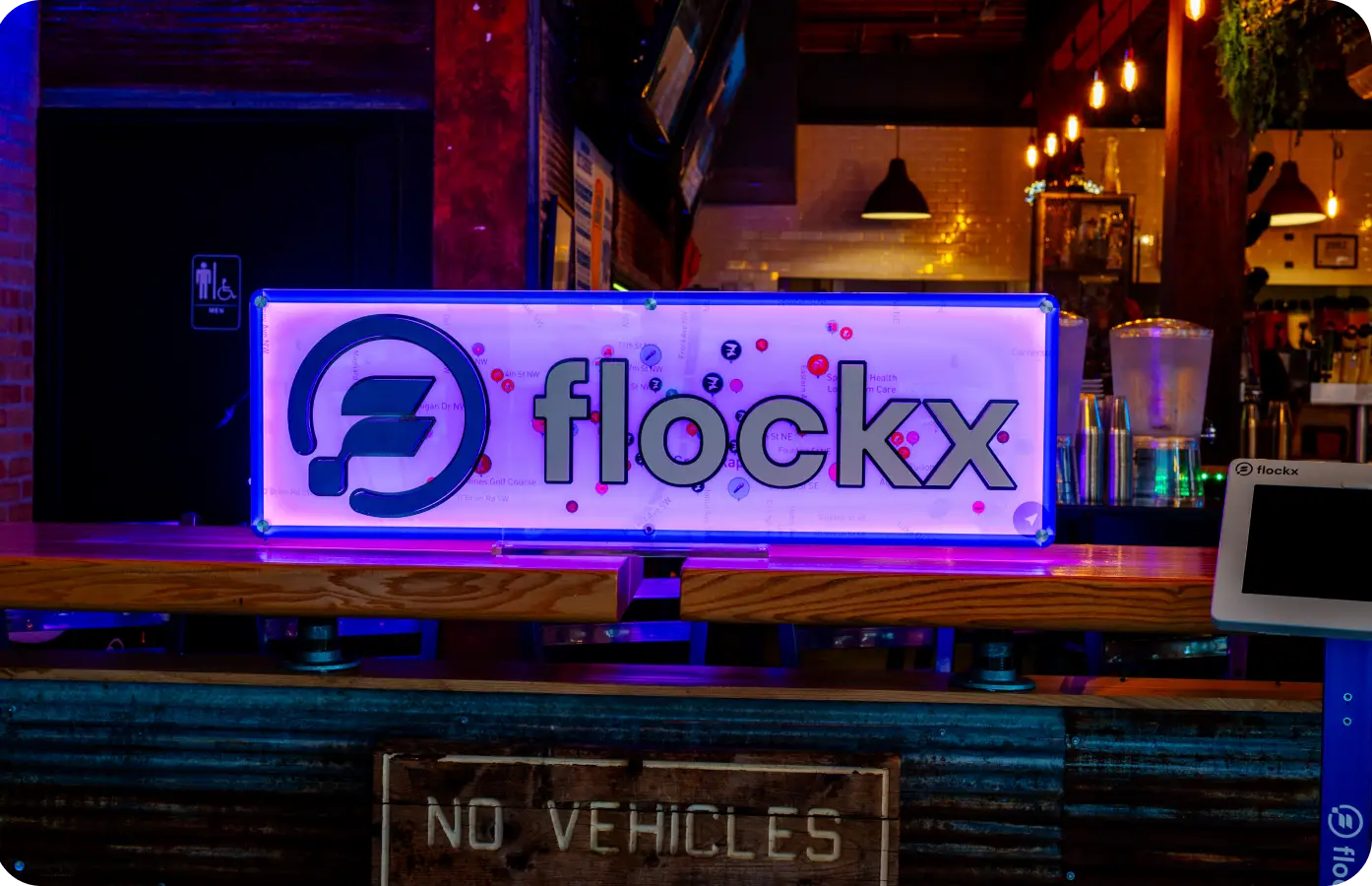 The Flockx Logo Which Is Devon Bleibtrey Company That Is leveraging Generative AI