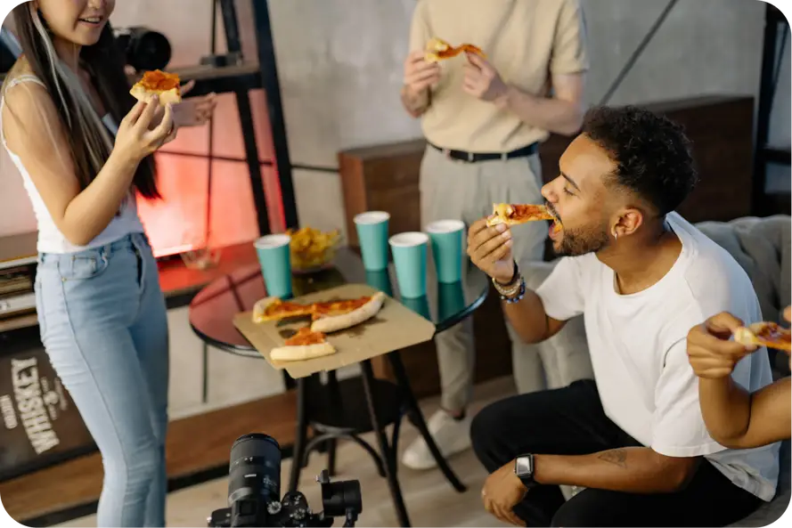 friends having a pizza party and having fun