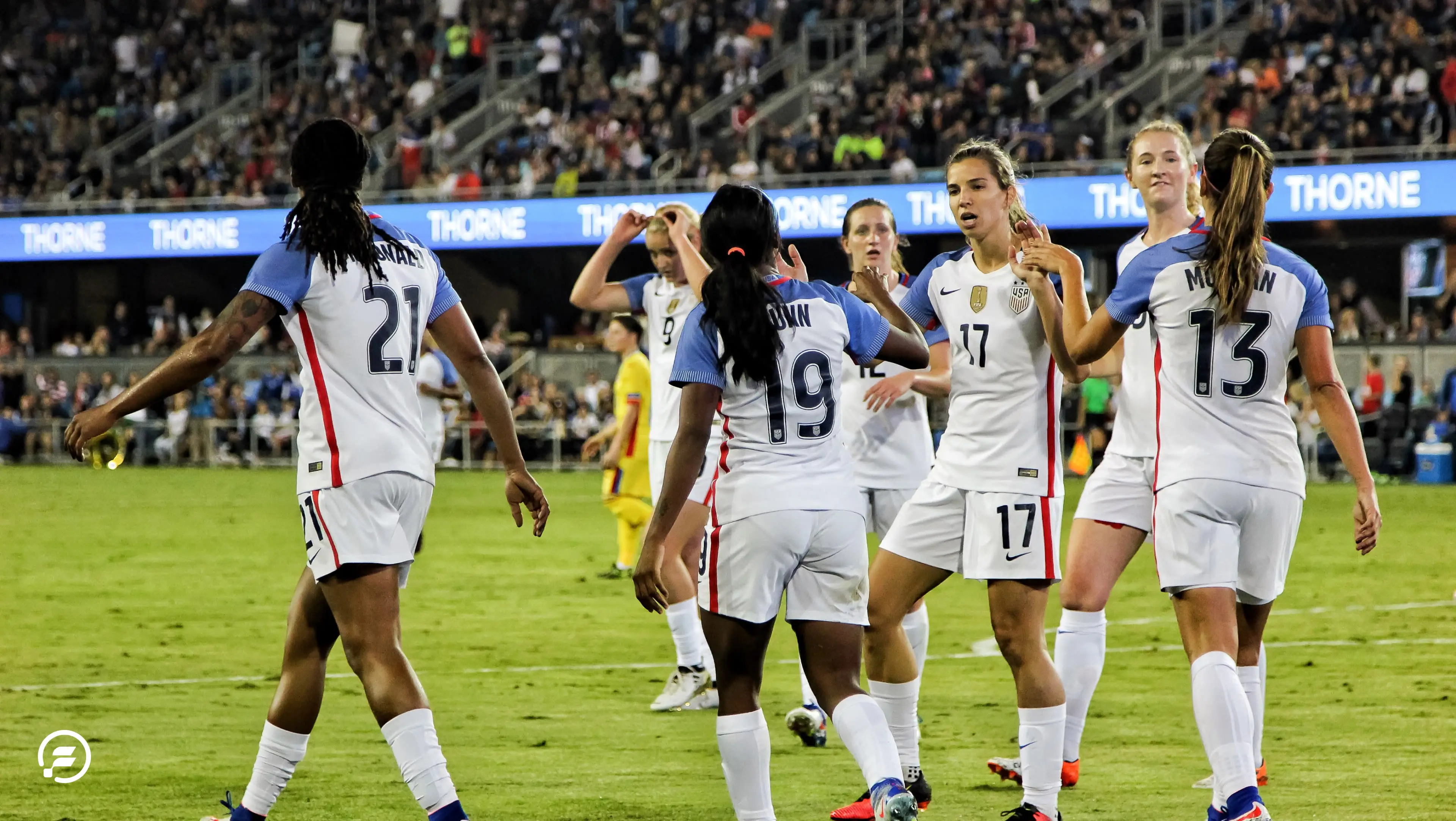 The United States Women's National Soccer Team on the pitch.